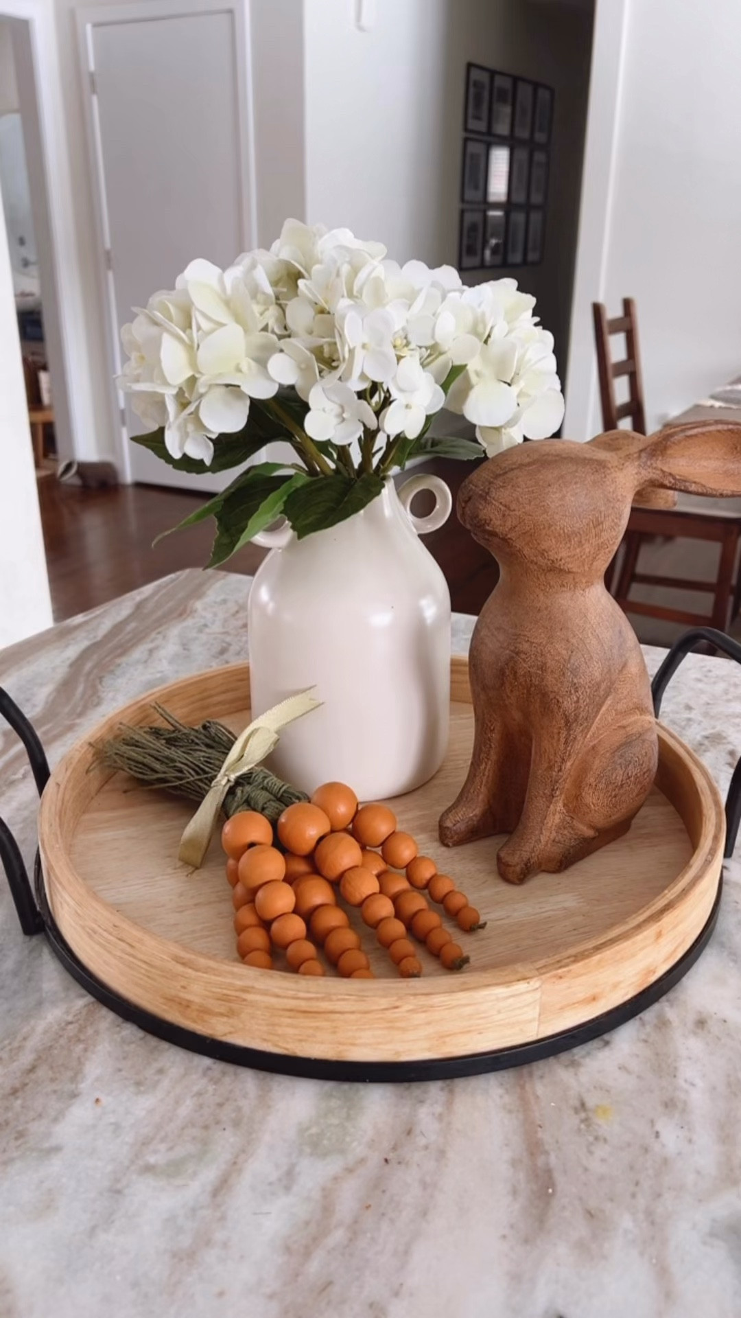 Easter brunch centerpiece idea with this Walmart vase, TJMaxx wood rabbit figurine and wood bead carrots! 🐰🥕#tray styling home decor budget spring refresh kitchen island 
