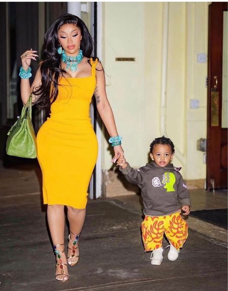 Cardi B stepped out in a yellow dress and $1,295 #gianvitorossi jeweled sandals. #cardib #shoes