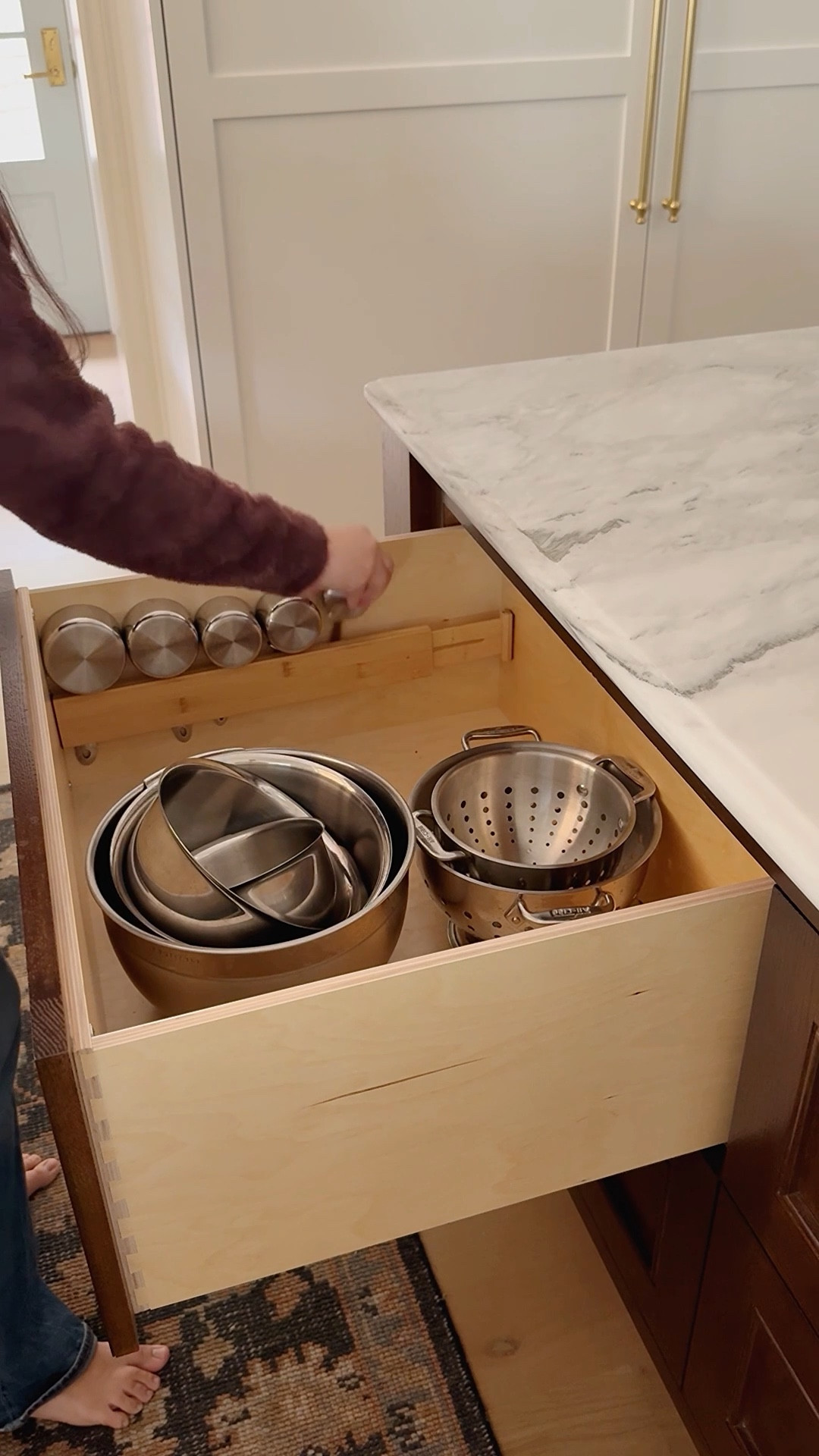 Organize your measuring cups by placing an adjustable divider into your kitchen drawers! Just make sure to measure the height of your drawers first!