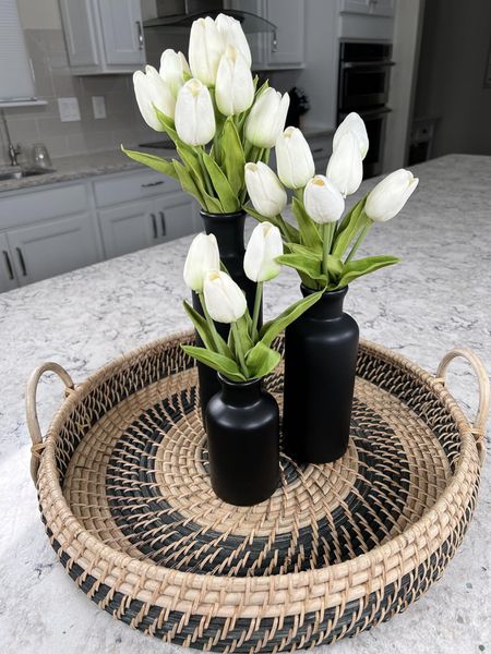 Black vase set, white tulips, and a pretty round wicker tray with handles. #amazon #amazonhome #founditonamazon #Mandy’s #tulips #fauxflowers #fauxtulips #wickertray #vase #vaseset #flowervase #homedecor #springdecor #home

#LTKhome