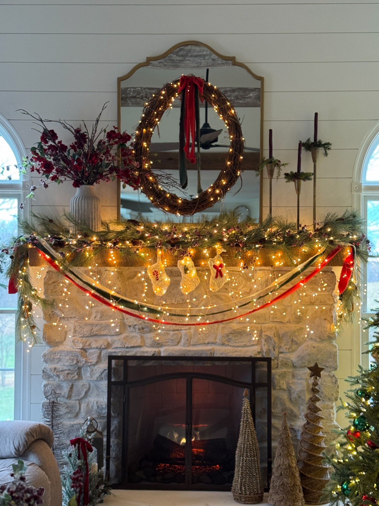 Create a festive and twinkly Christmas mantle with these soft twinkle icicle lights, mini twinkle lights on a rose gold wire, the sweetest tiny wool stockings (I just ordered a few more!) a 30” grapevine wreath and the softest velvet ribbon. Complete the look with faux berry stems, taper candles and a trio set of gold candle holders. 