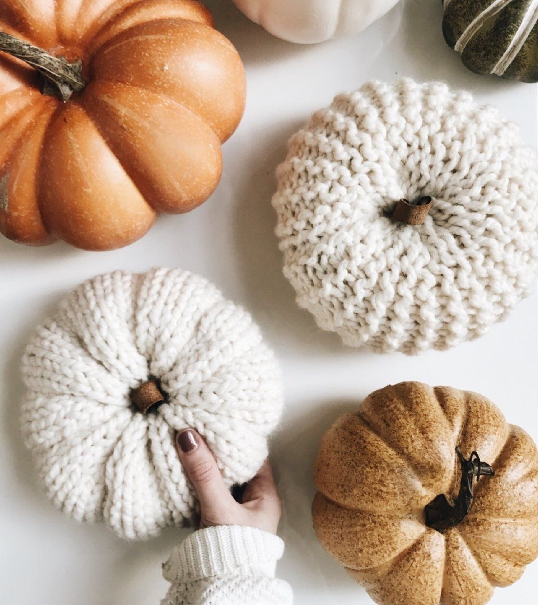 Indoor pumpkin decor- knit pumpkins and faux filler pumpkins

#LTKhome #LTKSeasonal #LTKHalloween