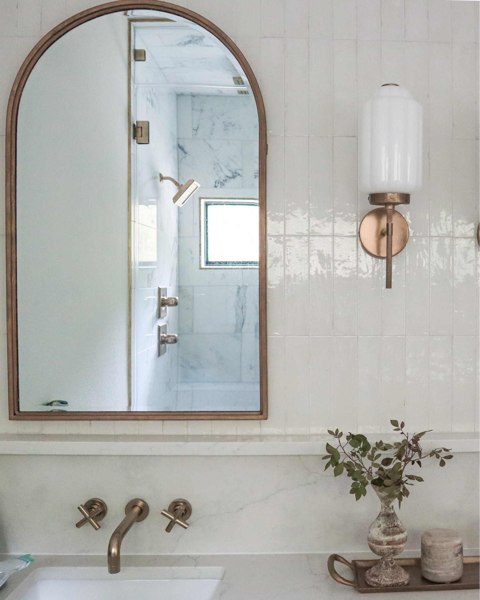 Bathroom gold qrch mirror on sale!

subway tile backsplash, sconces, faucet, vase, bathroom decor

#LTKstyletip #LTKsalealert #LTKhome