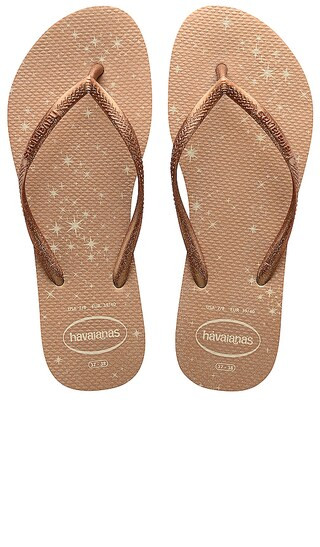 Slim Gloss Flip Flop in Beige | Revolve Clothing (Global)