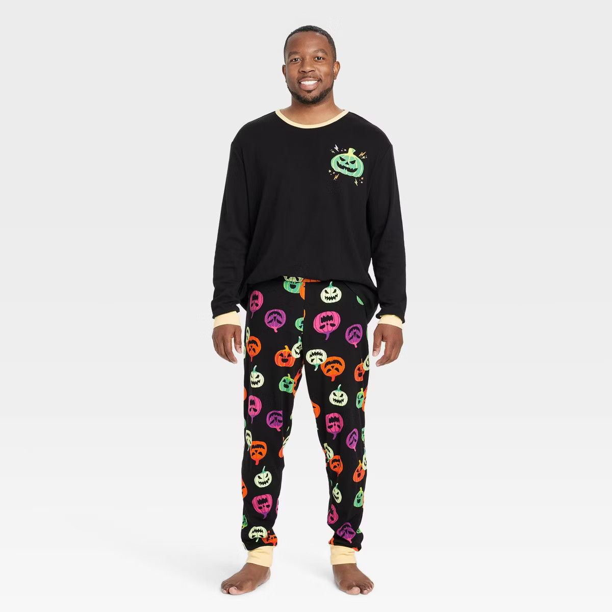 Men's Pumpkin Print Glow-in-the-Dark Halloween Matching Family Pajama Set - Hyde & EEK! Boutique... | Target