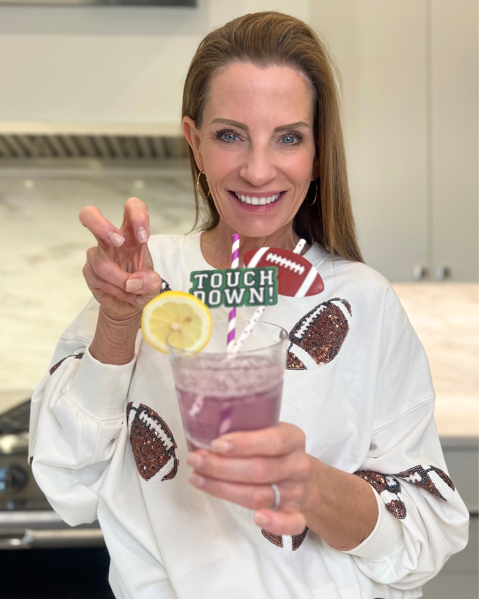 I love this sweatshirt for Game Day! Perfect for tailgates or football watch parties. So comfortable and spirited!🏈💜

#LTKSeasonal #LTKover40 #LTKparties