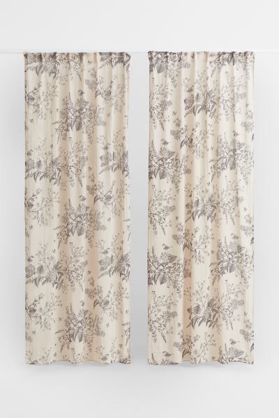 Two patterned curtain panels in a woven linen and cotton blend. Multiway header for four differen... | H&M (US + CA)