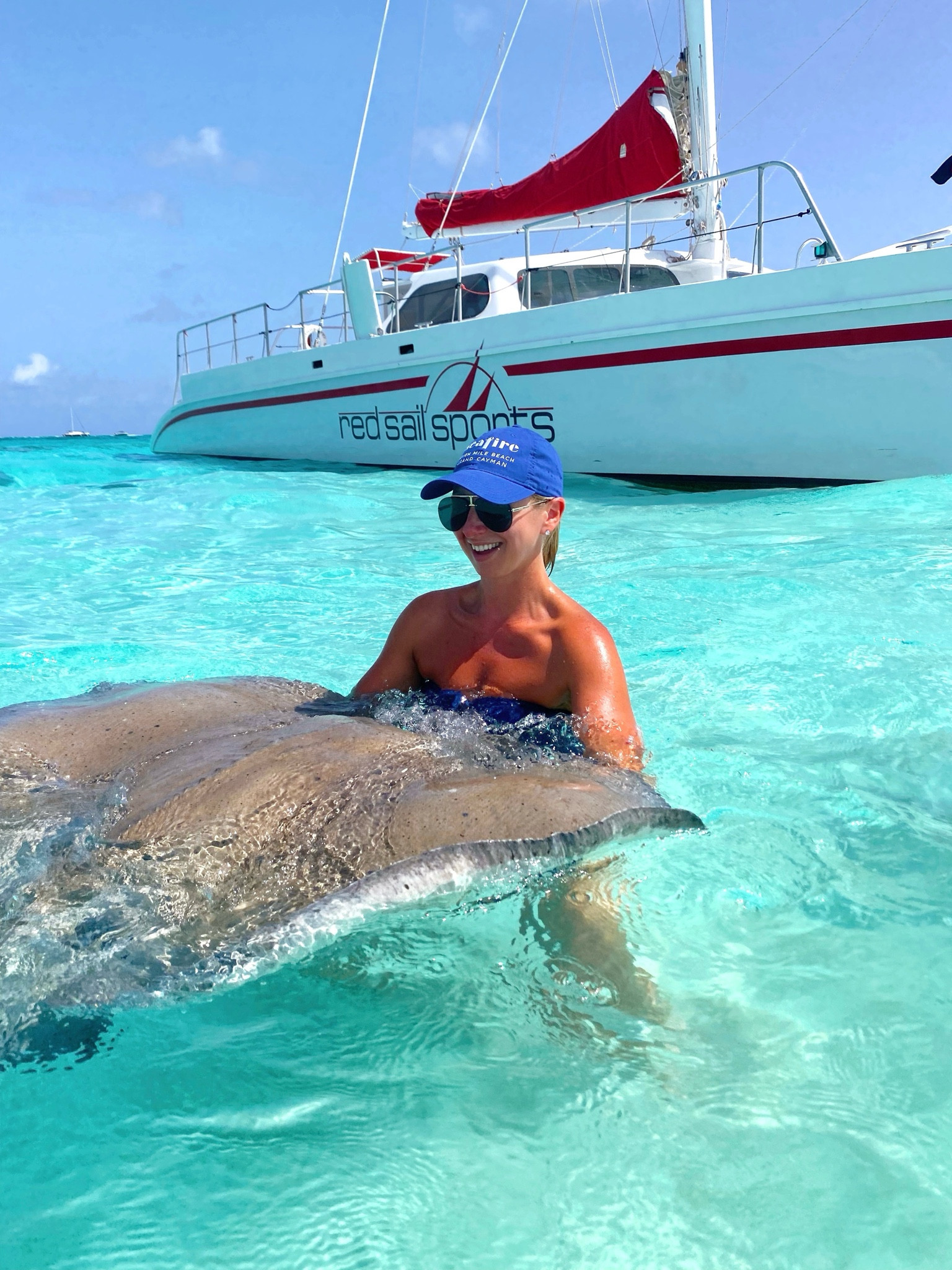 Home from the most amazing trip ever! 🩵🌴🌊🐠 We loved Stingray City so much, we went twice! It was truly magical! 🤩 Also can you even with this water color?? 🙌🏻🩵 If you go to Grand Cayman, we highly recommend @redsailsports (and ask to go on a charter with Maria if you can—she was amazing)! 🙌🏻 

Vacation, swimsuits, swimming, vacation style 

#LTKSwim #LTKTravel #LTKSaleAlert