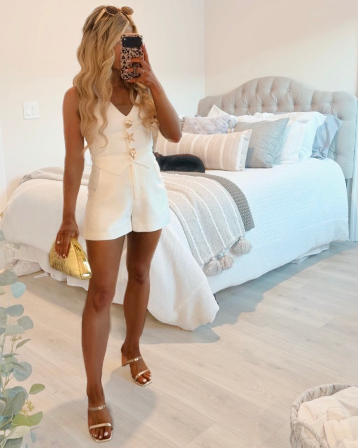 RESORTWEAR - chic white matching set styled as a resort outfit, vacation outfit, + spring break outfit! Matching gold shell clutch is designer-inspired! 

Coord set, shorts set, vest set, beach outfit, white vest, white shorts, highwaisted shorts, tailored shorts

#LTKootd #LTKSaleAlert #LTKTravel