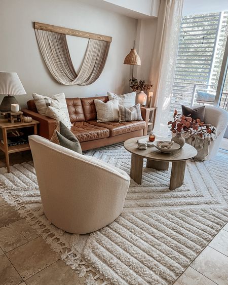 a look back at a favorite living room view 

Rug, coffee table, accent chair, swivel chair, boho art, fiber art, end table, throw pillow, throw blanket, neutral decor,  neutral home, living room decor, organic modern living room

#LTKStyleTip #LTKHome