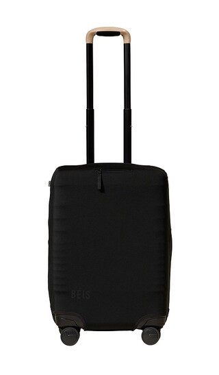 BEIS The Carry-On Luggage Cover in Black. | Revolve Clothing (Global)