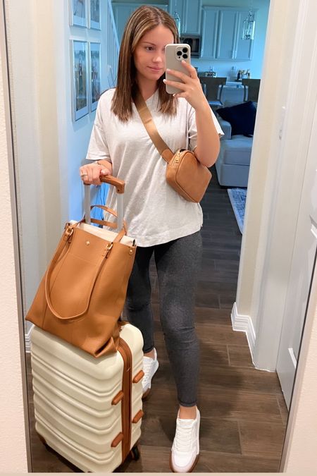 Comfy airport outfit 
Travel outfit 
Sneakers 
Luggage 
Suitcase 
