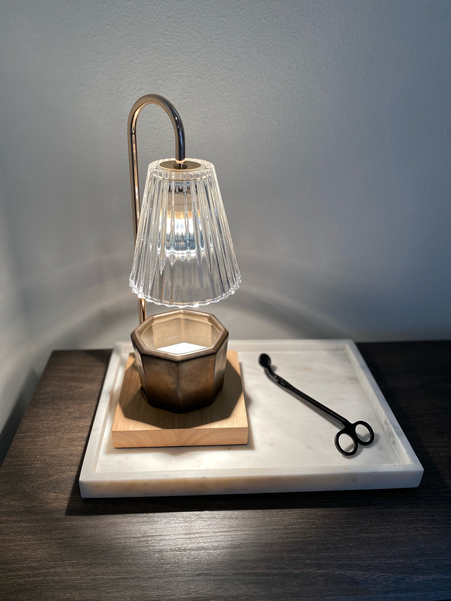 I love this candle warmer because not only is it cute, but it is so much better for the air quality vs burning the wick. I noticed that my candles last longer when I use the warmer. And the intensity of the scent is comparable to when I burn the wick. It also gives me peace of mind to not have to worry about having an open flame and the light is dimmable!

#LTKhome