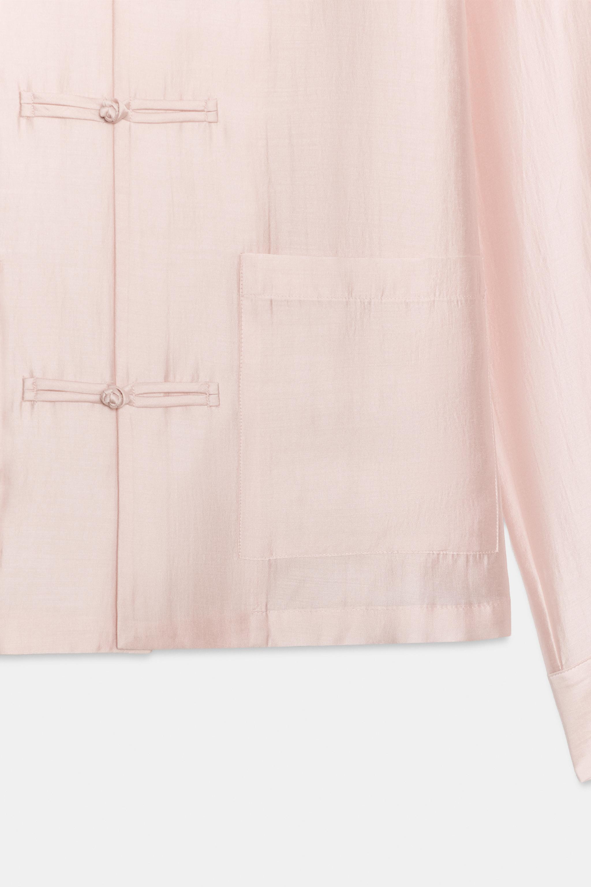 ZARA WOMAN COLLECTION. Shirt made from a lyocell blend yarn. Featuring a round neck and long slee... | Zara UK