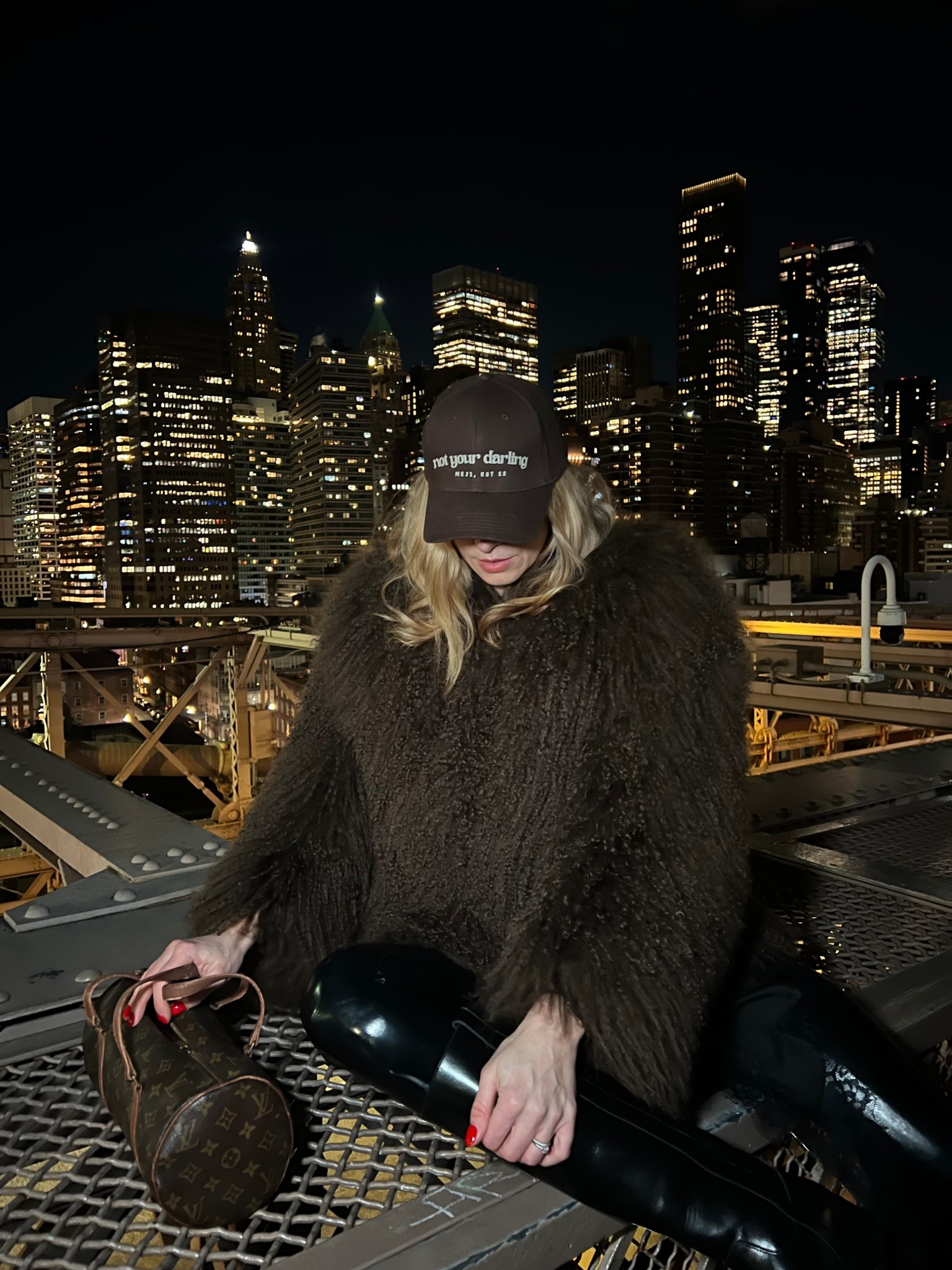 Mongolian fur coat, wet look leggings, brown cap, riding boots 

#LTKwinter #LTKeurope #LTKuk