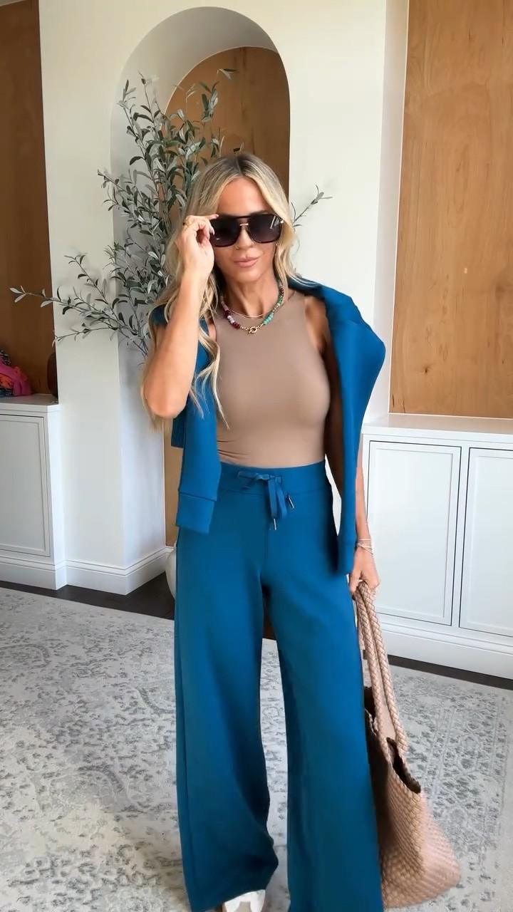 Elevated travel outfit - this loungewear set is so luxe and the wide leg pants come in length options! Perfect airport outfit or just a comfortable everyday outfit for mom life that is so elevated ✨

#traveloutfit #airportoutfit

#LTKmomlife #LTKgrwm #LTKTravel