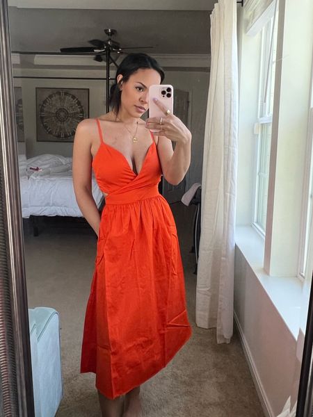 Found this super cute orange dress. It’s the perfect little dress for summer. It has adjustable straps with a small cut out in the back. Size down - I am wearing an XXS. 

#LTKwedding #LTKSeasonal #LTKunder100