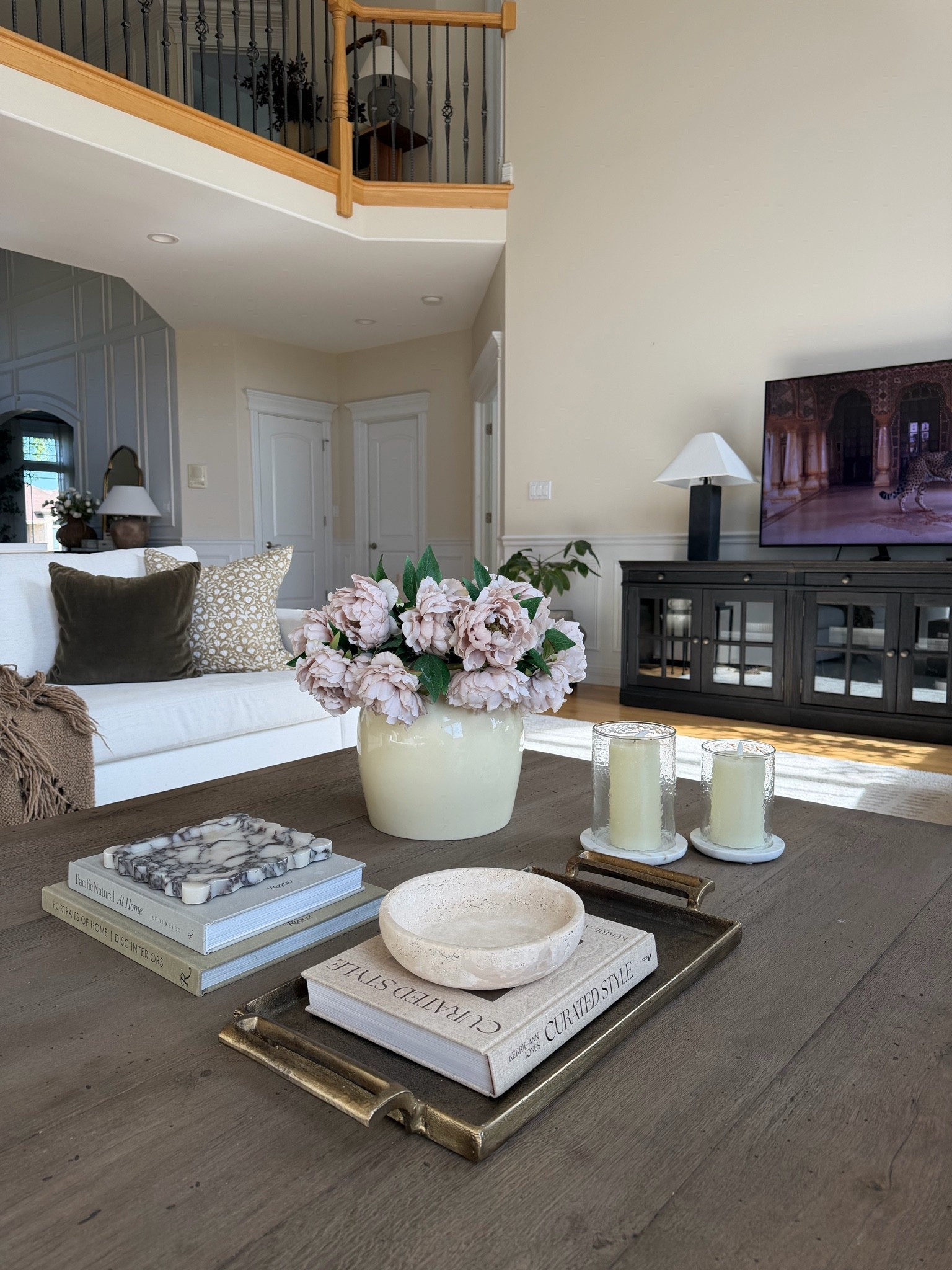 Coffee table details that make the whole room feel finished 🤍 Neutral layers, soft florals and warm wood tones I’ll never get tired of.

#LTKHome