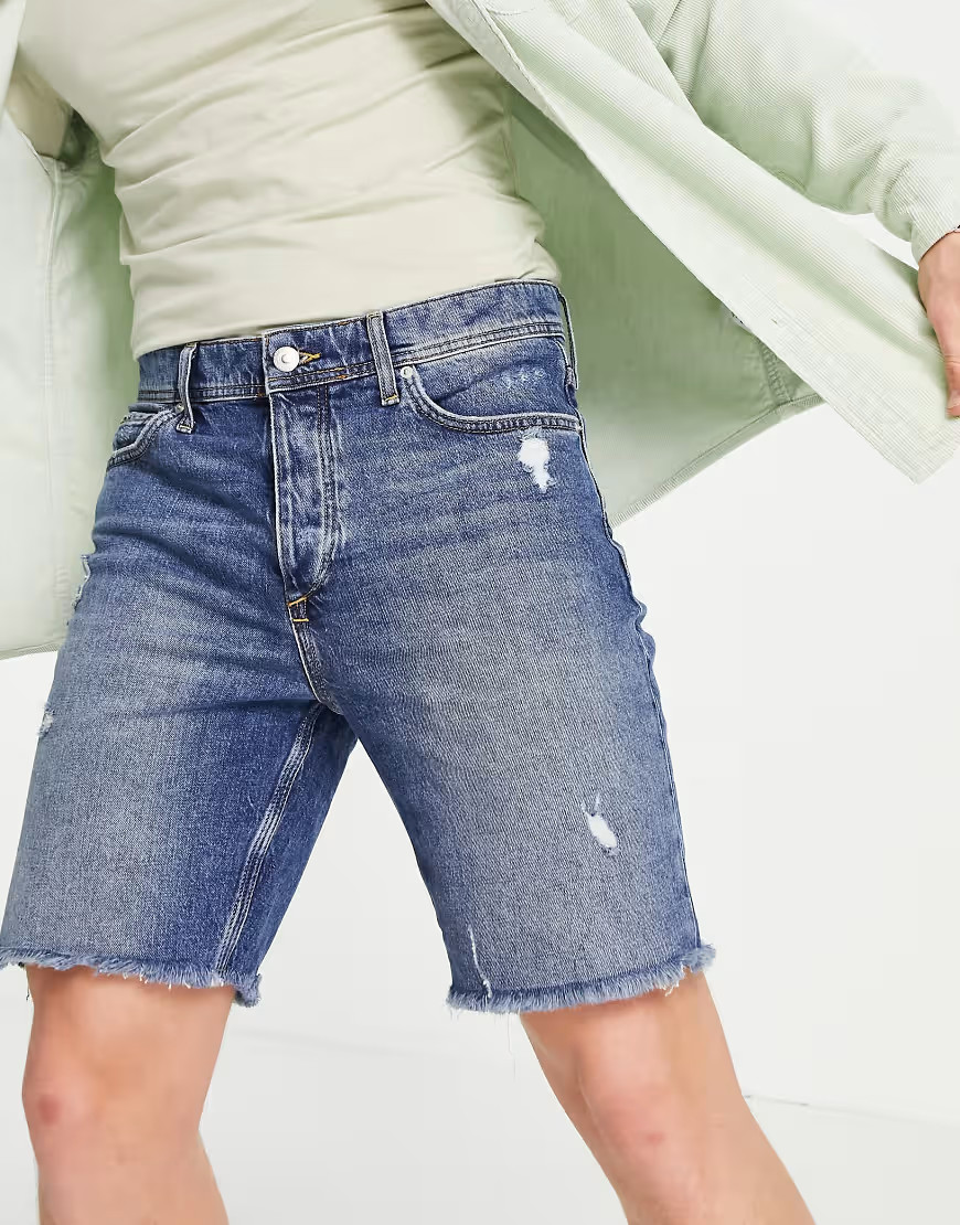 River Island slim denim cut off shorts in mid blue | ASOS (Global)