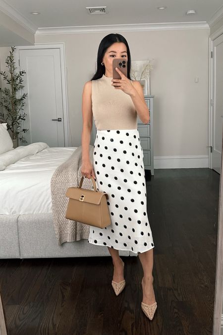 •Ann Taylor polka dot slip skirt xxs petite. This one is fully lined with a stretch waistband. Waist fits a little big on me and measures 13” across when lying flat 

•Mock neck shell xxs petite . This skirt also looks great with the staple black mock neck top I linked and often wear.

•Woven slingbacks sz 5

•Cafune bag (not linkable on LTK; linked on my blog)

#petite summer workwear business casual office outfit ideas 

#LTKworkwear #LTKstyletip #LTKSeasonal