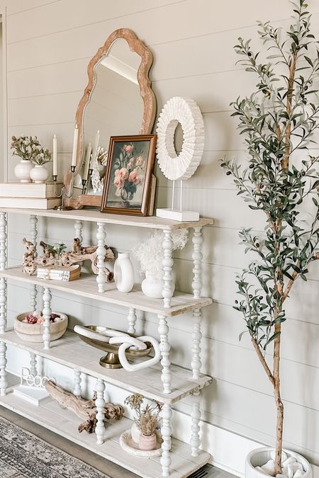 Shelf decor including the beautiful real wax battery operated candles and this adorable olive tree 

#LTKSeasonal #LTKhome #LTKFind