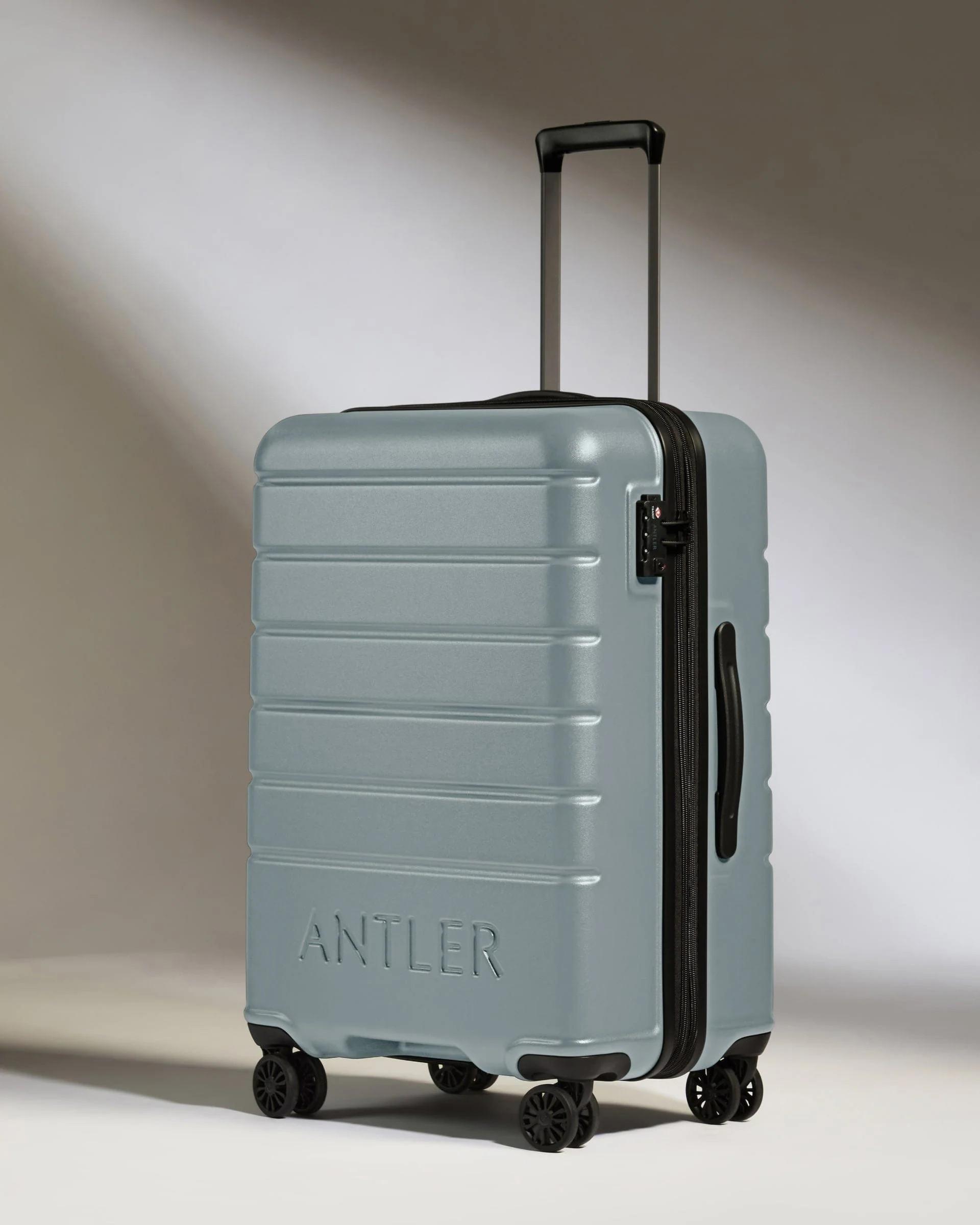 Medium Suitcase Cool Grey - Logo | Lightweight Hard Shell Luggage | Antler UK