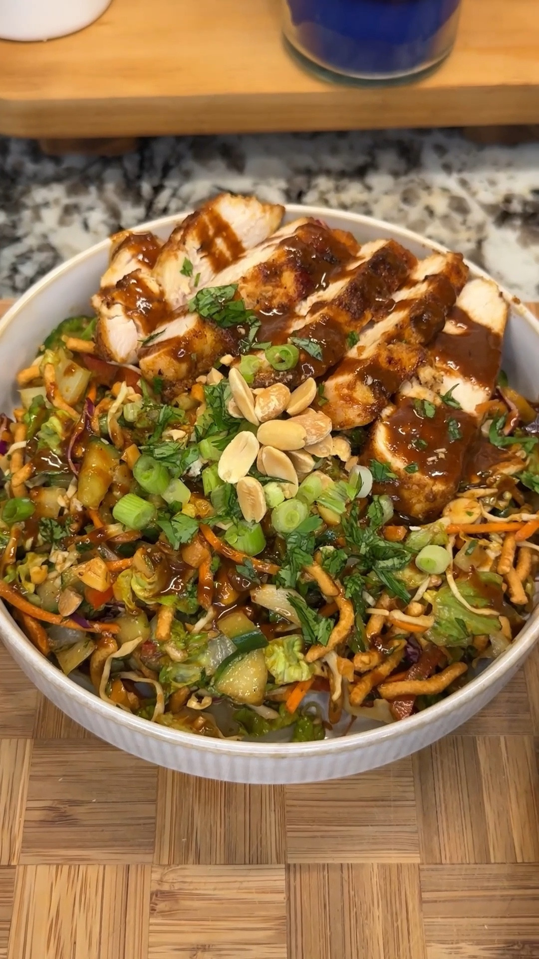 this thai-inspired peanut chicken salad is a flavor bomb in every bite 🥜🌶️🫑🍗✨loaded with colorful, crunchy veggies, juicy chicken, and tossed in the dreamiest peanut dressing- it’s fresh, bold, and anything but boring! 


#kitchenfavorites #cookingessentials #kitchendecor #cookingmusthaves

Ingredients:
- 2 boneless skinless chicken breasts
- 1 tsp salt
- 1 tsp black pepper
- 2 tsp paprika
- 2 tsp onion powder
- 2 tsp garlic powder
- 1 tbsp olive oil
- 1 cucumber, diced
- 1 cup shredded carrots
- 1 romaine heart, chopped
- 1.5 cups shredded cabbage
- 1 red bell pepper, sliced thinly
- 1/3 cup peanuts, roughly chopped
- 1 cup chow mein crunchy noodles

dressing:
- 1/3 cup soy sauce
- 2 tbsp peanut butter
- 1 tsp sesame oil
- 1 tsp onion powder
- 1 tsp garlic powder
- 1 tbsp rice vinegar
- 1 tbsp honey
- 1 tsp chili crisp
- salt and black pepper to taste


#LTKHome #LTKFamily #LTKSeasonal