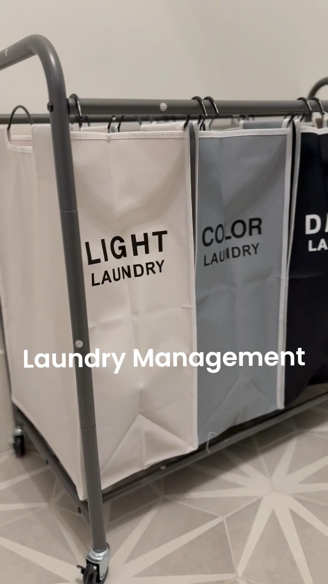 This labeled, mobile laundry sorter lets you collect clothes as you go and fold right where you need to—no more hauling heavy baskets room to room. Sorting made simple, laundry made easier.