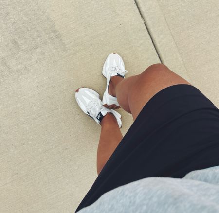 Neutral tennis shoes and skort