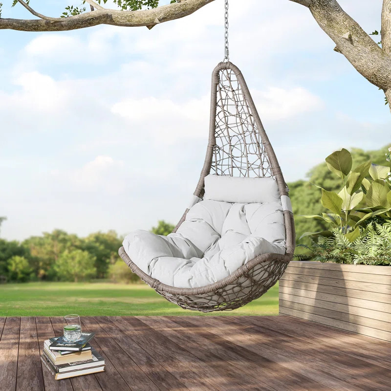 Sol 72 Outdoor™ Kya Wicker Porch Swing with Cushion & Reviews | Wayfair | Wayfair North America