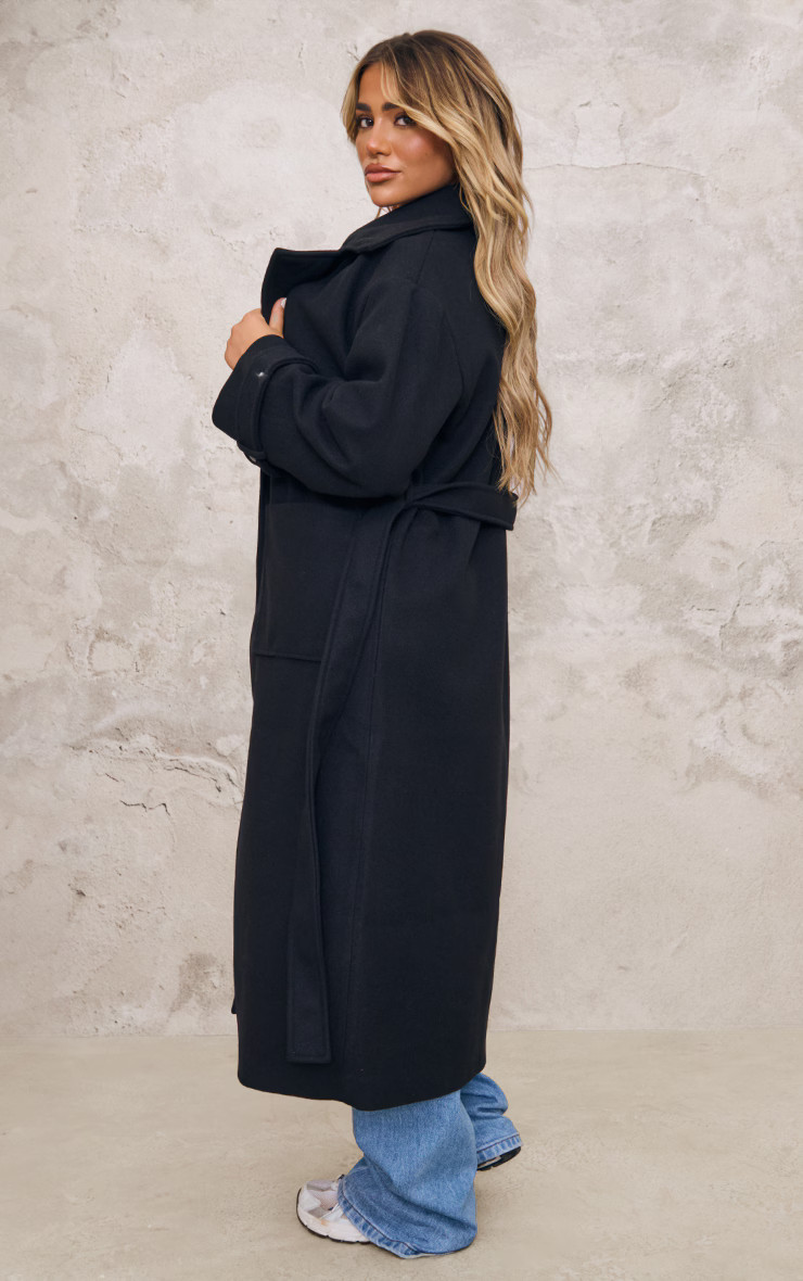 Black Maxi Panel Detail Belted Coat | PrettyLittleThing UK