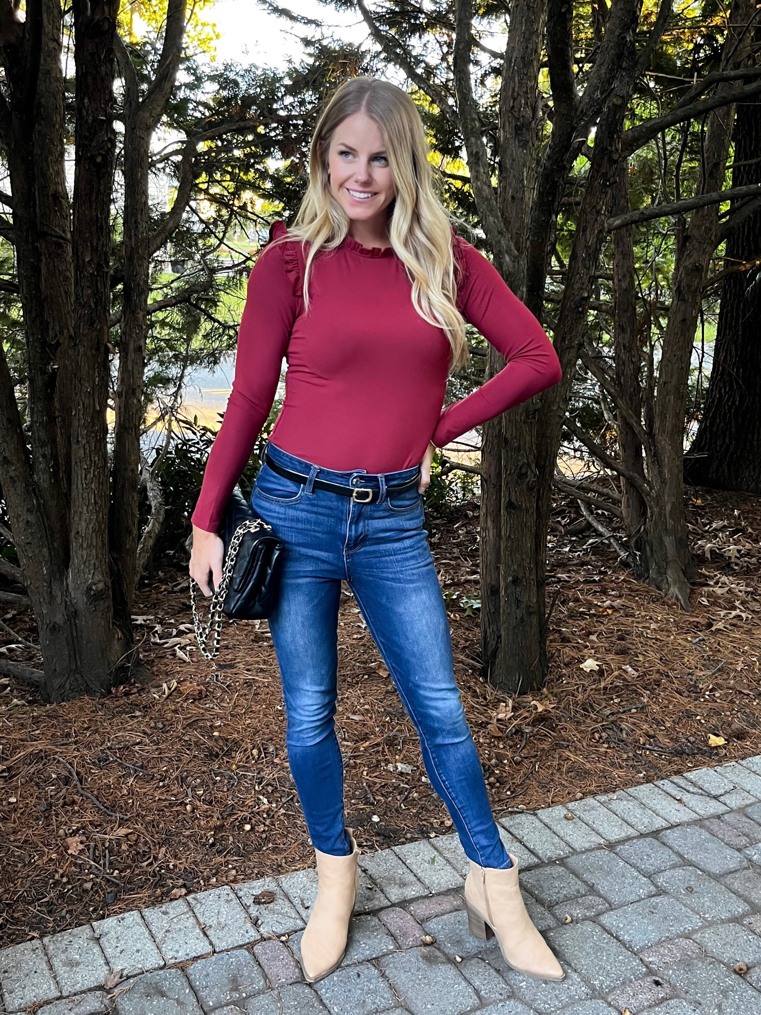 Love this ruffle bodysuit. Super soft! Runs TTS- wearing size small! 

#LTKSeasonal #LTKunder50 #LTKunder100