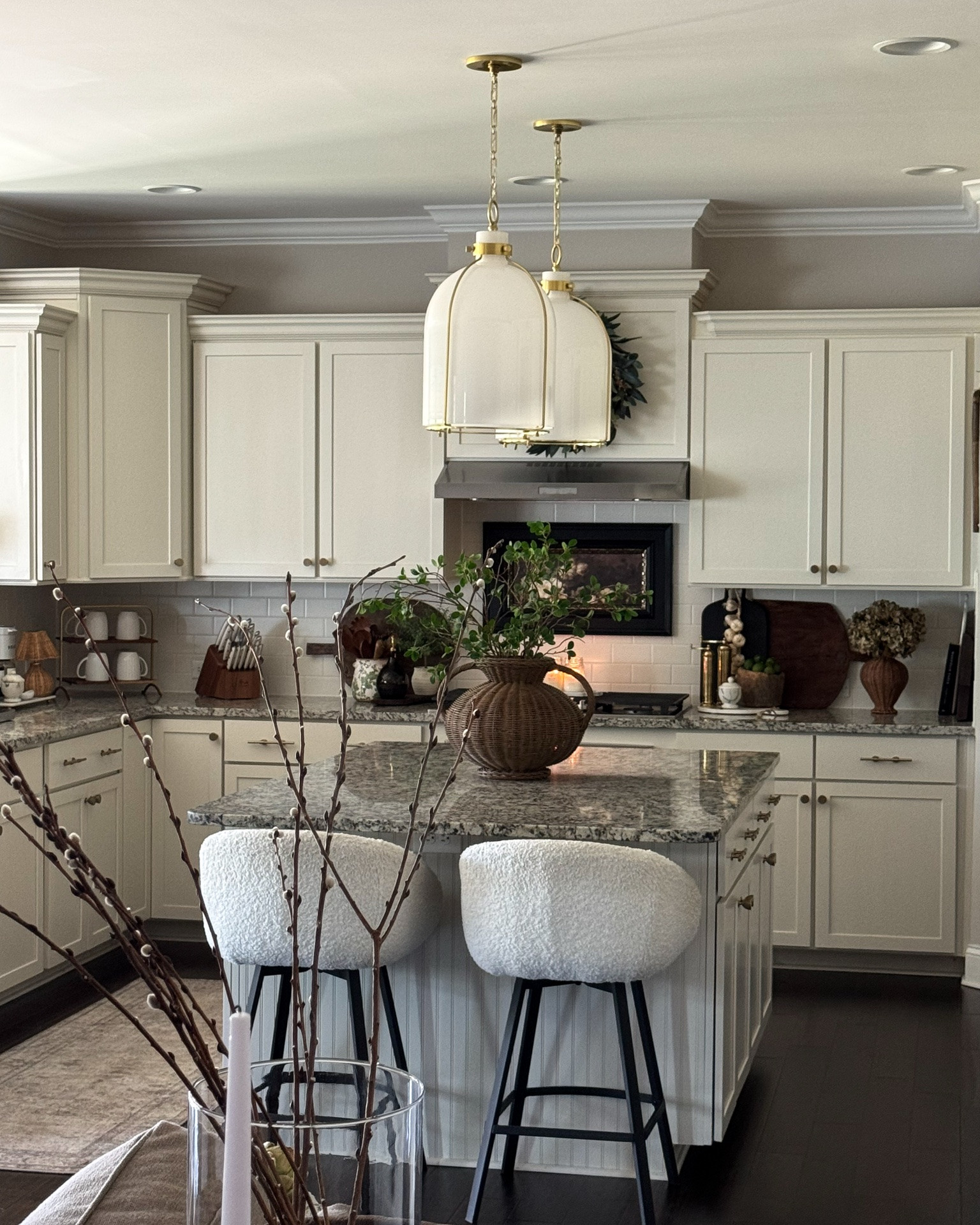 Modern Vintage Kitchen
Spring Kitchen

Floral green crock, island pendants, counter stools, vintage inspired door knob, gold kitchen faucet, moody hydrangeas, brass salt & pepper mills, marble bowl, ceramic lace serving board, champagne bronze hardware, runner, olive oil dispenser, gold spouts, garlic garland, black cutting board, green wreath, vintage cutting board, vintage wood bowl, woven vase, greenery

#LTKstorytime #LTKSeasonal #LTKHome