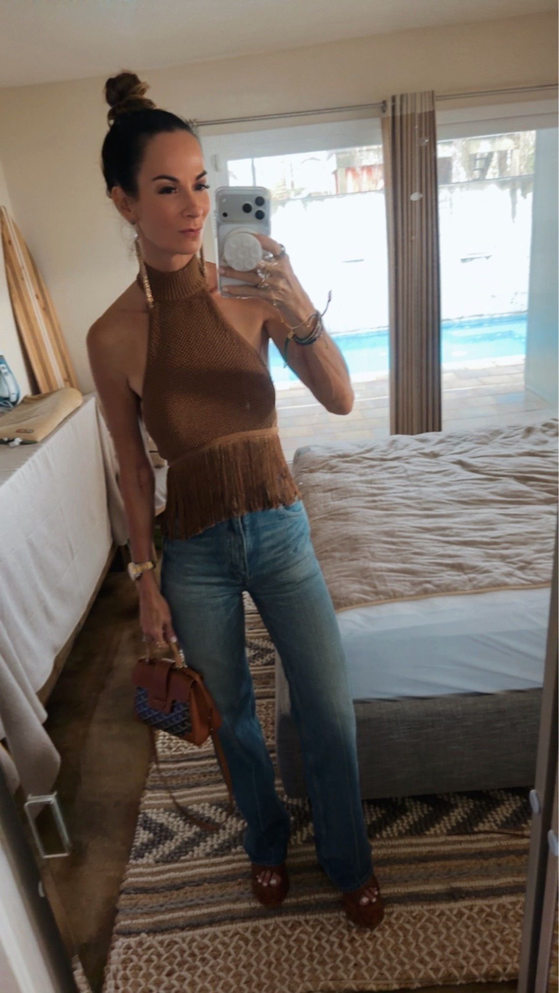 Last night’s look brought a little ’70s sass—and I am here for every bit of it. 🤎✨

Saint Laurent jeans, sky-high Chloé platforms, a fringe top that understood the assignment, and my Goyard bag to finish it off. Because if the fringe isn’t moving and the platforms aren’t platforming… are we even going out? 💃🏻

#SaintLaurentStyle #ChloeGirls #FringeFashion #DesignerStyle #Over40Style

#LTKgrwm #LTKootd #LTKdayinmylife
