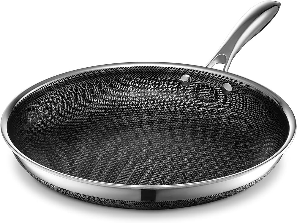 HexClad Hybrid Nonstick Frying Pan, 12-Inch, Stay-Cool Handle, Dishwasher and Oven Safe, Inductio... | Amazon (US)
