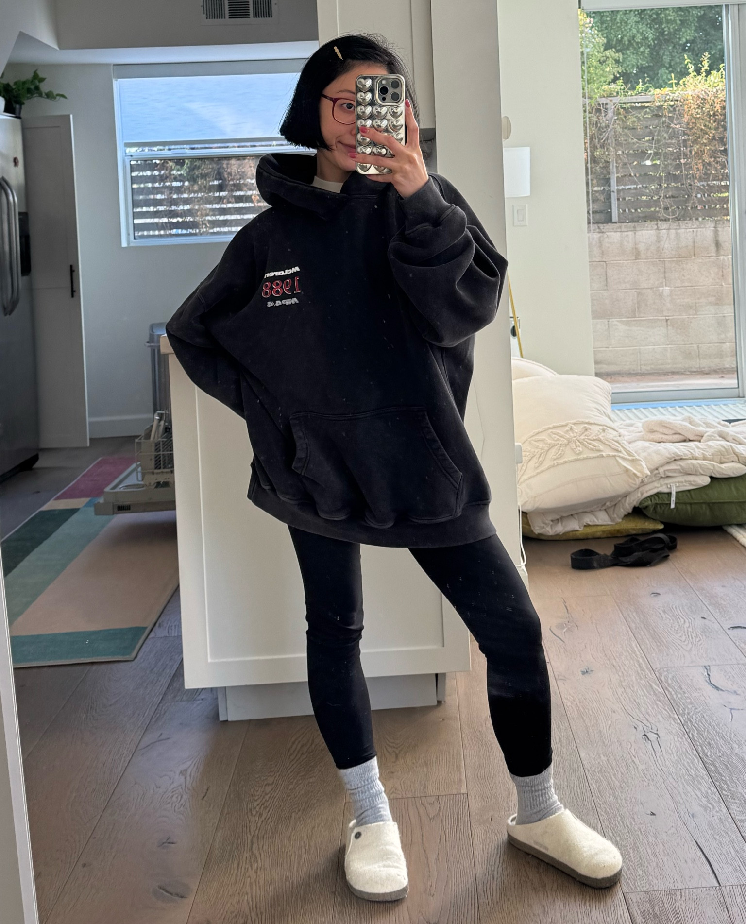 COMFY BUT COOL hoodie, soft stretchy leggings and cozy slippers. i am petite (4'11" and wearing small in leggings, medium in hoodie and 6 in slippers). love this phone case, it's such a statement! 

#LTKStyleTip #LTKSaleAlert #LTKActive