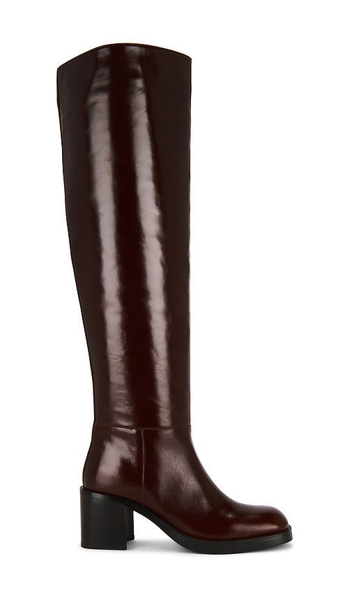Jeffrey Campbell Vinyl Over The Knee Boot in Cognac. Taglia 7.5. Also in 10, 6, 6.5, 7, 8, 8.5, 9. | Revolve Clothing (Global)