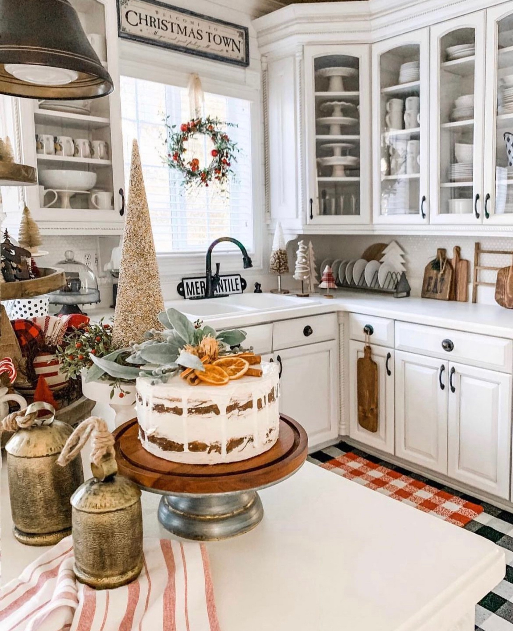 Small Christmas trees and cake stands create a lovely holiday vibe in the kitchen 

#LTKSeasonal #LTKhome #LTKstyletip