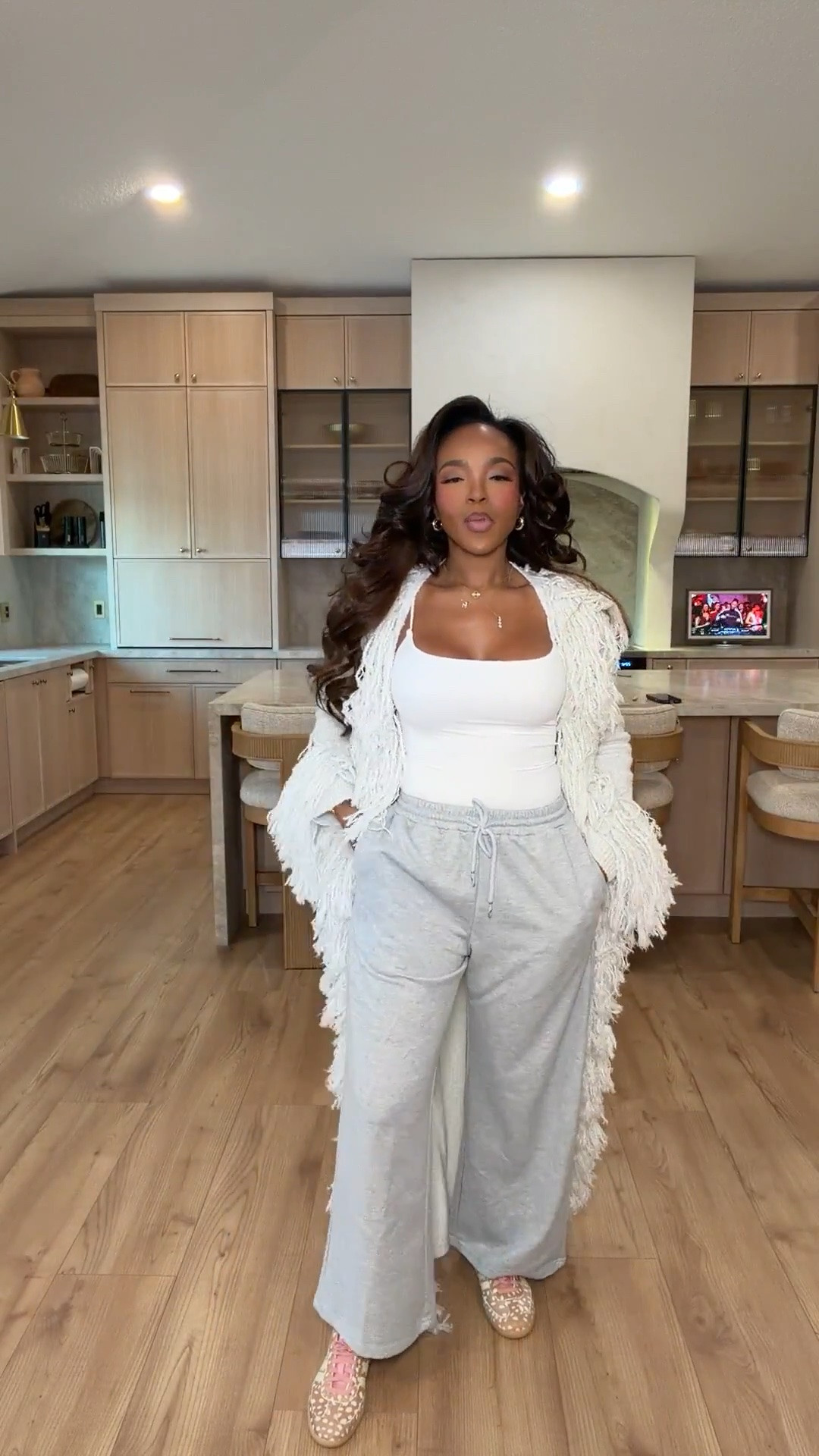 Cozy but make it chic! 🤍✨

This white fitted tank paired with relaxed gray wide-leg sweatpants and a statement textured cardigan is the ultimate cozy chic outfit! The perfect mix of comfort and effortless style for running errands, coffee dates, travel days, or lounging in style. Proof that casual can still look put together!

Everything is linked below! 🛍️

cozy chic outfits, gray wide leg sweatpants, white tank top outfit, textured cardigan outfit, elevated loungewear, casual fall outfits, comfortable travel outfits, airport outfit inspiration, trendy mom outfits, effortless everyday style, neutral casual outfits, cozy fall fashion, relaxed weekend outfits, stylish sweatpants outfit, casual street style