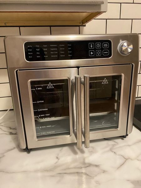 Emeril Lagasse 26 QT Digital Extra Large Air Fryer with French doors 
It cooks in half the time our oven does. It’s incredible and I can’t say the last time we actually used our oven because of this air fryer! So worth it!

Conviction toaster oven with French doors, stainless steal air fryer, air fryer,
Kitchen, kitchen appliance, cook, cooking food, oven, home, homestead

#LTKfamily #LTKSeasonal #LTKhome