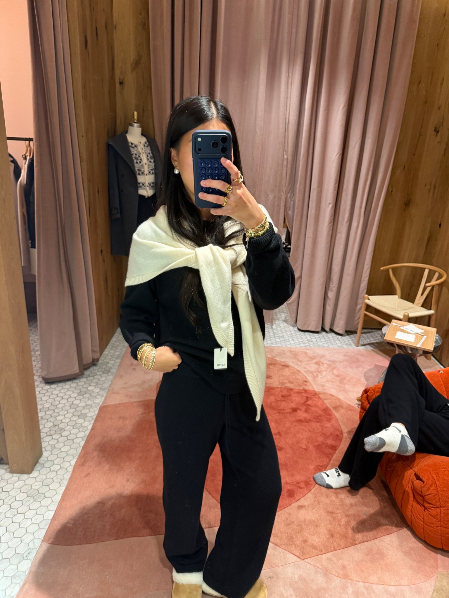 wearing size S in pants + sweater in black