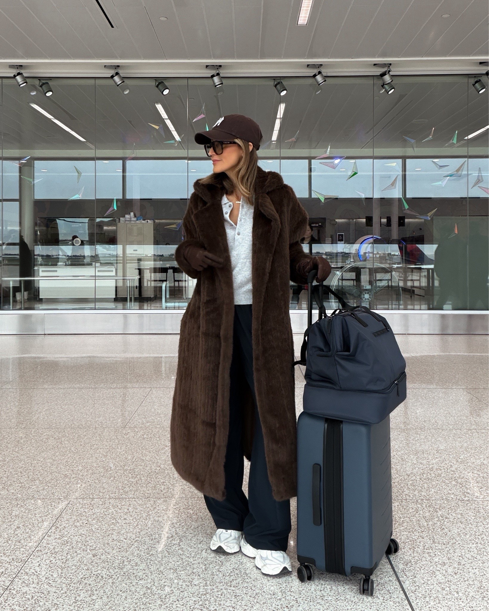 Airport outfit - all about cozy comfy but make it cool!! This faux fur coat will be my one for all this trip, great price point! My pants are the softest and on a special 20% off for new customers through 3/15 
New luggage is giving designer (for so much less!) 

#LTKOver40 #LTKTravel #LTKootd