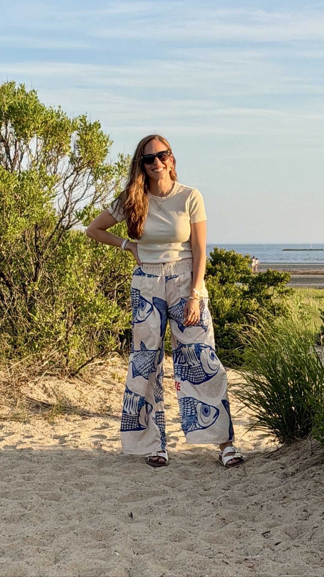 More things I’m grateful for: summer concerts on the beach & shell art adding to my mermaid art collection in my shoreline home. Wearing my sardine print palazzo pants, equally on brand with my shoreline wardrobe (they are inexpensive and so much fun to throw on for a beach walk or can be dressed up!) the whole look is linked here. What are you grateful for this summer? 🌊🫶🏼🐚

#LTKootd #LTKmomlife #LTKSeasonal