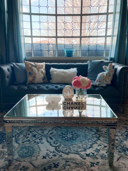 Easter living room decor - Easter decor - Easter home decor - spring decor - spring home decor - living room - interior design - tufted sofa - chesterfield sofa - mirrored coffee table - Easter pillows - seasonal pillows - Amazon home 

#LTKSeasonal #LTKunder50 #LTKhome