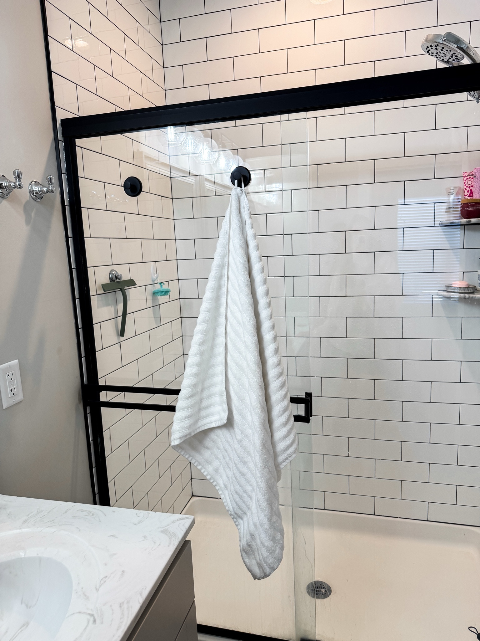 Pack of two towel holders that suction cup to your glass. Also obsessed with these $14.00 bath sheets. 

#LTKHome