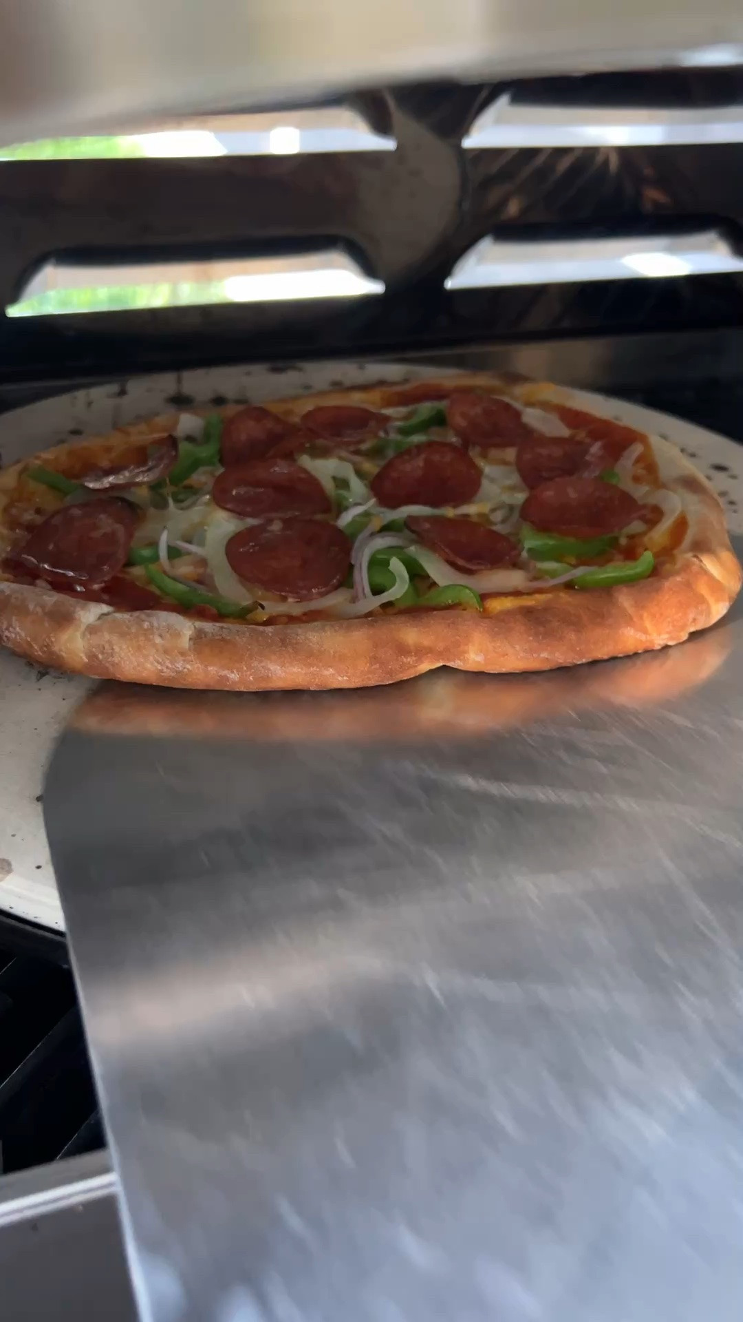 The grill I use is discontinued, but I found a similar grill that does the same but unfortunately you need to buy the pizza stone separately. I have it all linked below.
