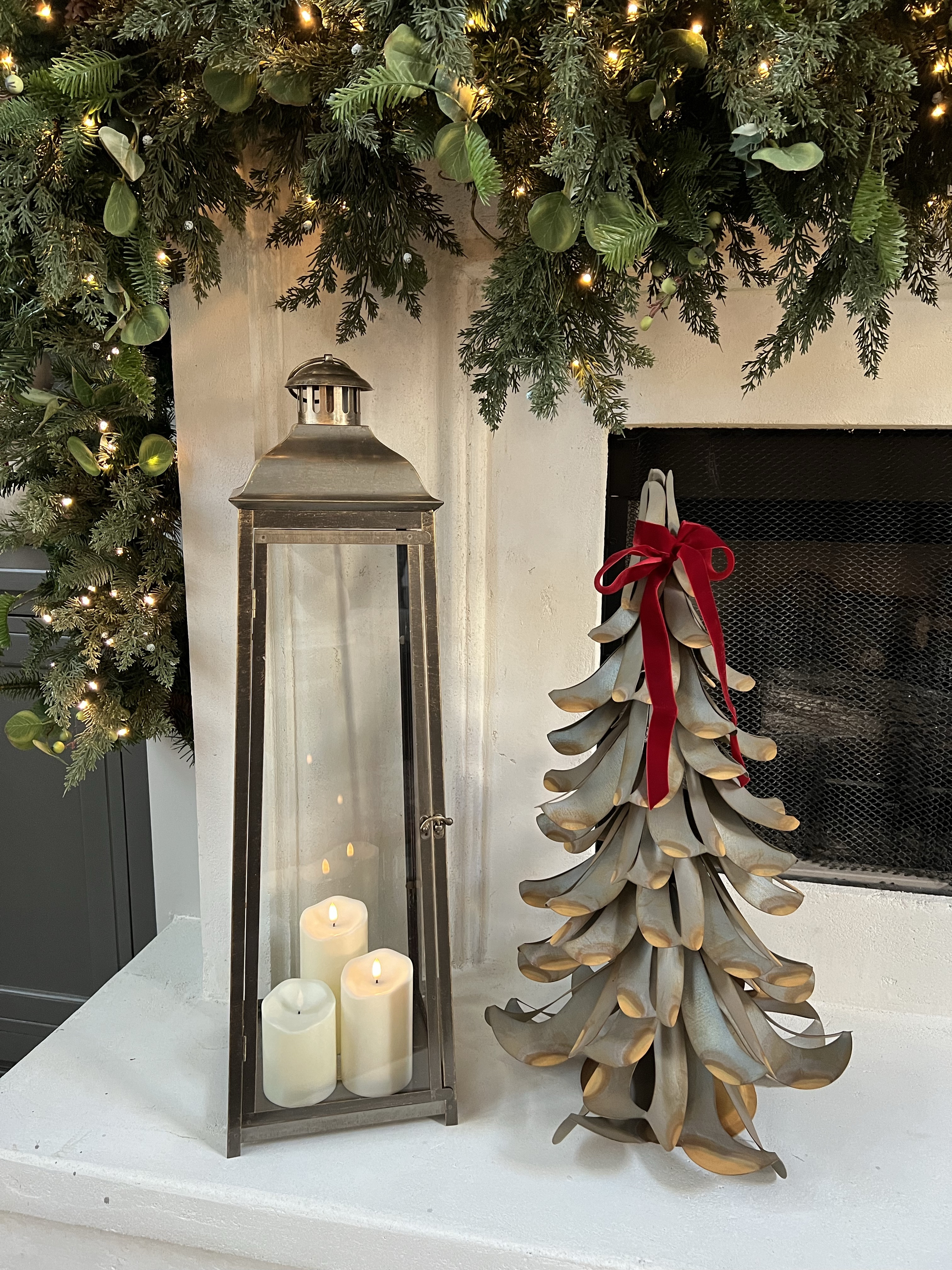Holiday mantle garland from last year!✨🎄🎅🏼

holiday garland, mantle decor, holiday decor, stockings, candle, lantern, holiday garland, front gate, metal tree, Caleigh Hardy 

#LTKHome #LTKHoliday #LTKSeasonal