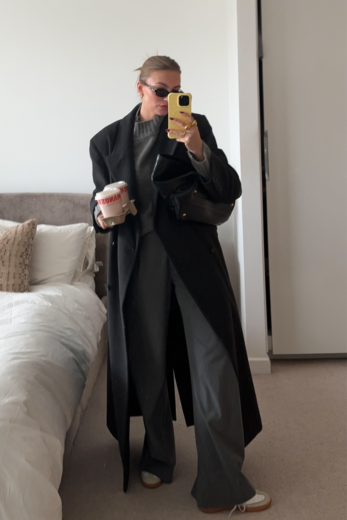 Off duty outfit 
Grey head to toe outfit 
Grey maxi coat 
Grey knitted turtleneck 
Grey tailored trousers 
Adidas sambas
Black work bag 
