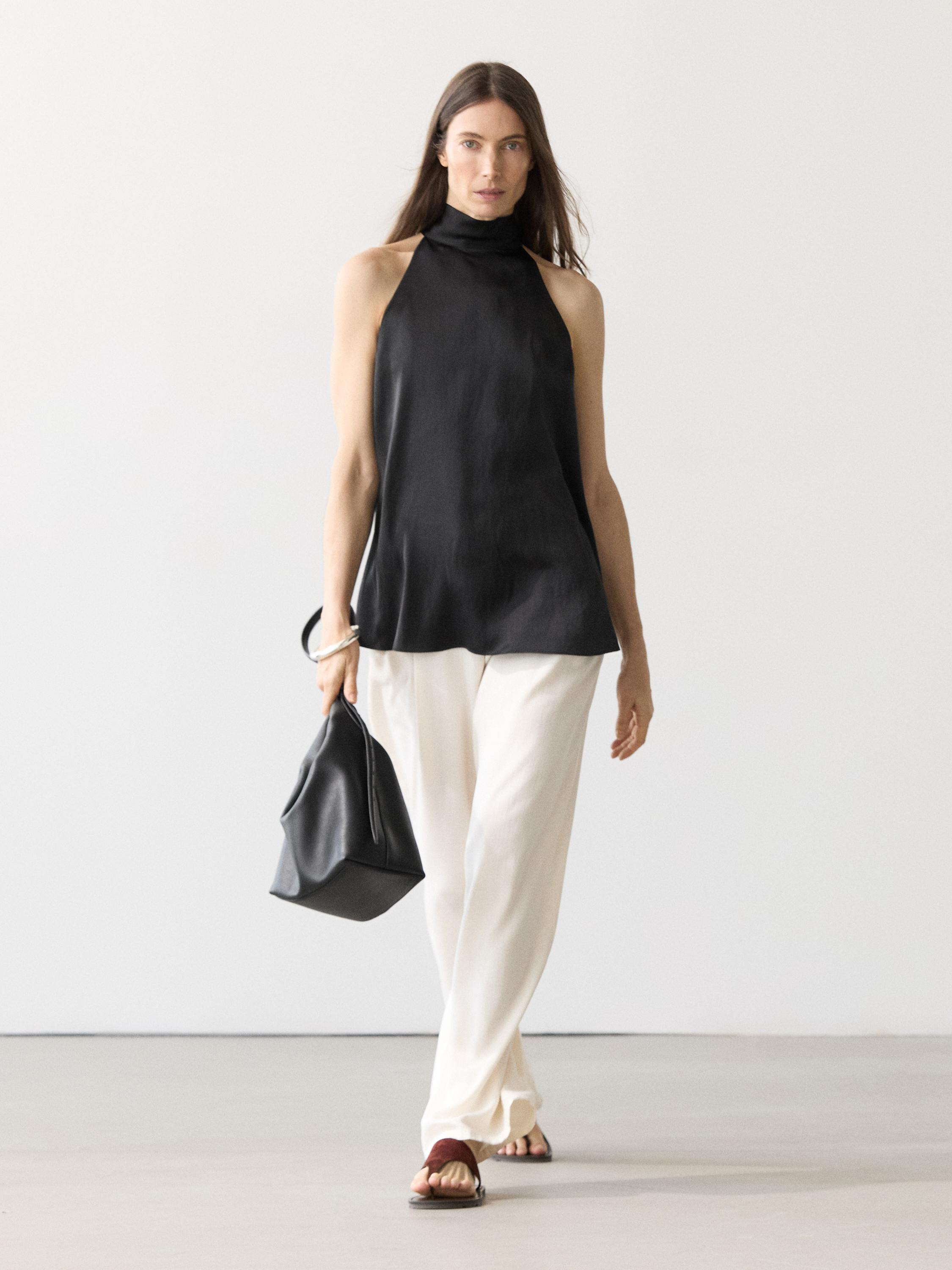 VIEW LOOK
Satin halter top with tie detail

 £59.95  -30% * £39.95  Colour:  Black  Add to bask... | Massimo Dutti UK