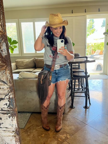 Look 2 for the country concert, this isn’t my first rodeo T shirt, cowboy boots, straw cowboy hat, fringe boho bag, rhinestone belt? Turquoise jewelry. 

#LTKstyletip #LTKSeasonal #LTKtravel